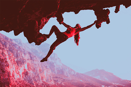 Woman rock climbing image